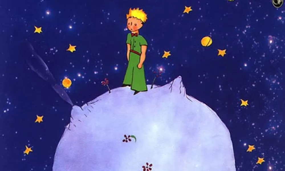 the little prince standing on a planet